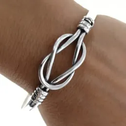Pulsera plata Ley 925m rígida 70mm. centro nudo marinero macizo unise