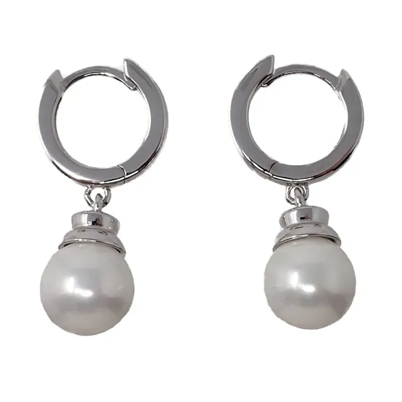 Pendientes plata Ley 925m terminación rodio 32mm. aros perla sintética colgando
