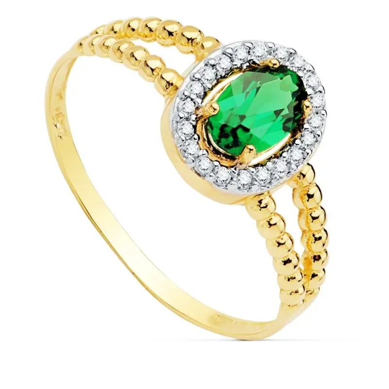 Sortija oro bicolor 18k mujer centro piedra verde 6x4mm. cerco circonitas laterales bandas