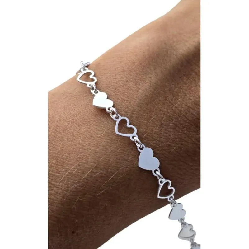 Pulsera en Plata Ley 925m de 16 cm. con corazones lisos y calados de