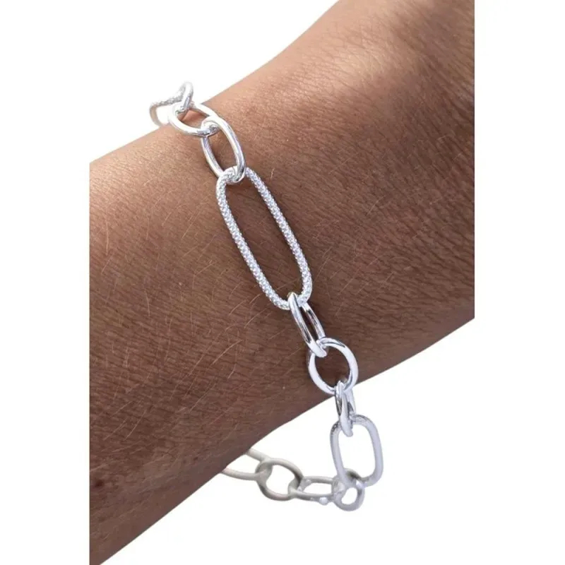 Pulsera en Plata de Ley 925m con asas lisas de 10 mm. combinadas oval
