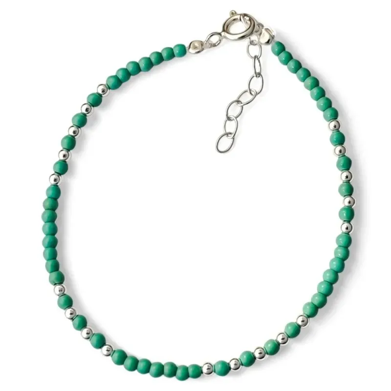 Pulsera en Plata de Ley 925m de 17 cm. bolas color turquesa combinada