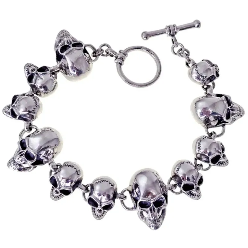 Pulsera Calaveras en Plata de Ley 925m con 21 cm. tamaños de 21 y 15