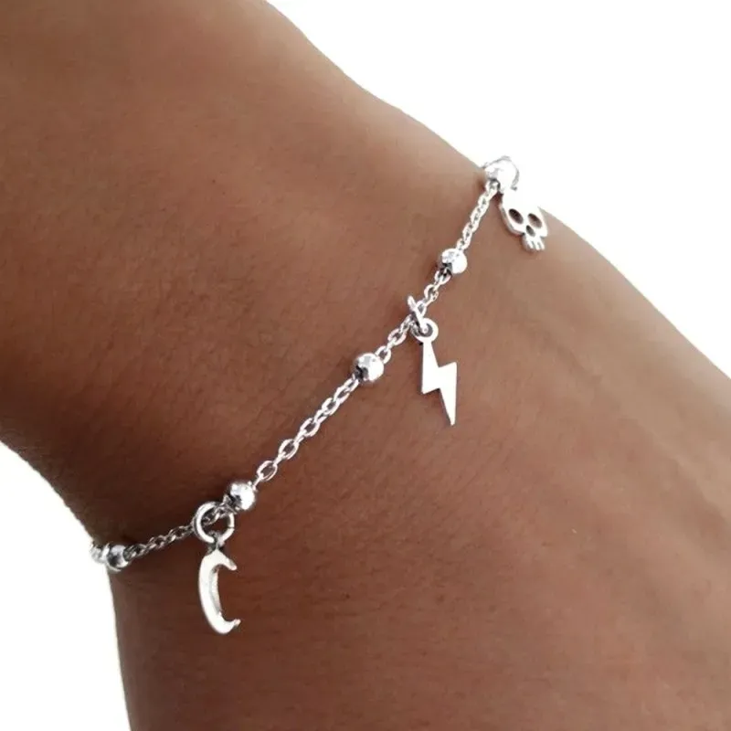 Pulsera en Plata de Ley 925m con 19 cm. motivos colgantes cruz calave