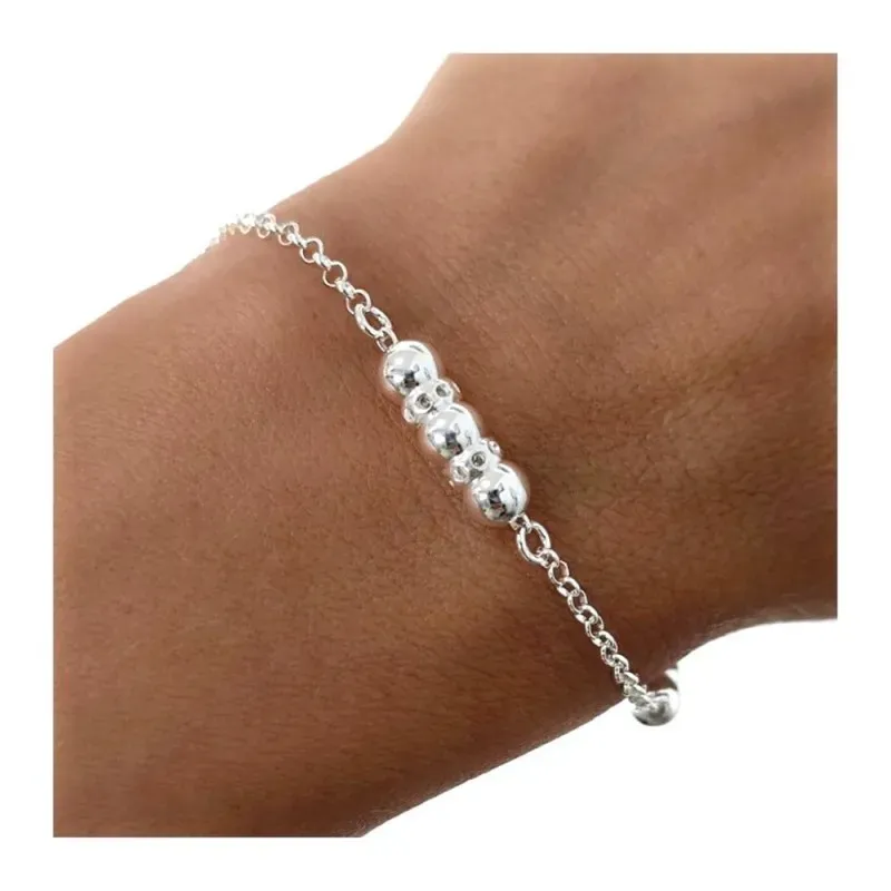 Pulsera en Plata de Ley 925m con 17 cm. cadena rolo entrepiezas bolas