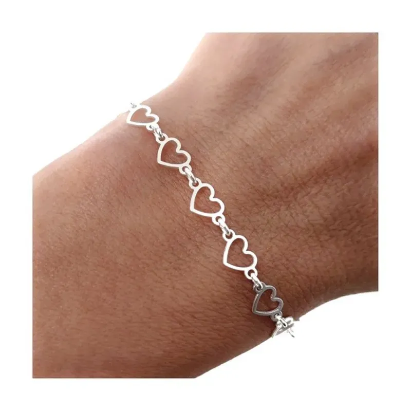 Pulsera en Plata Ley 925m de 16 cm. con corazones calados de 6 mm.