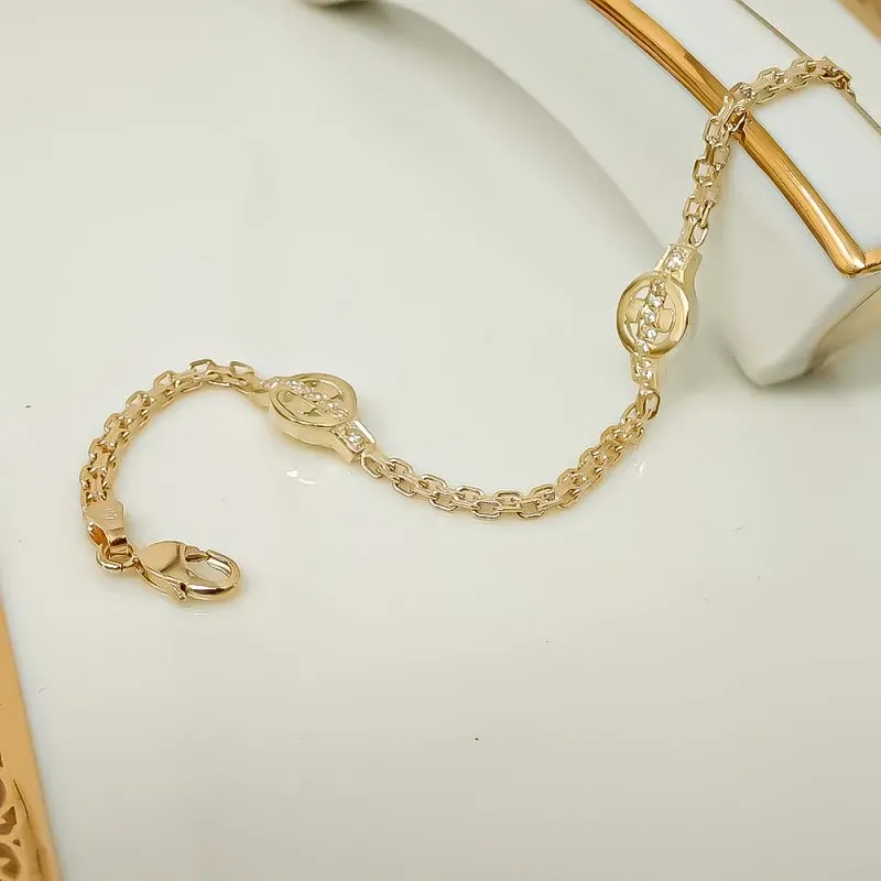 Pulsera oro 18k niña 16.7cm. circonitas cierre mosquetón