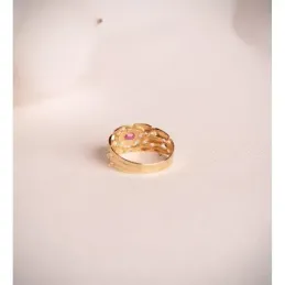 Sortija Panter en Oro 18k con rubí natural de 4 mm. combinada circoni