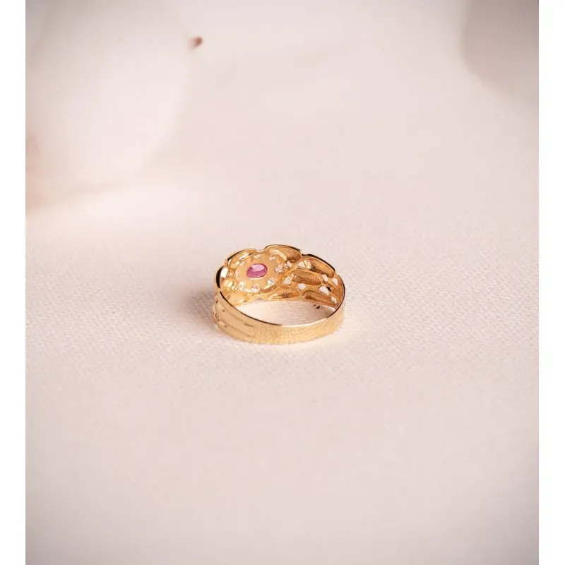 Sortija Panter en Oro 18k con rubí natural de 4 mm. combinada circoni