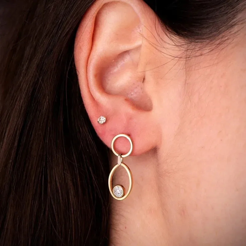Pendientes Largos Oro Bicolor 18k con 23 mm. aros calados con detalle