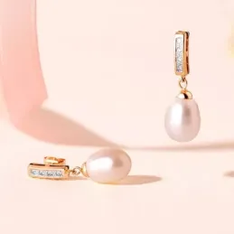 Pendientes en Oro Bicolor de 18k con 25 mm. perla forma pera circonit