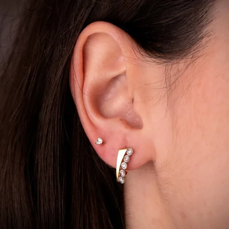 Pendientes en Oro Bicolor de 18k con 14 mm. detalles redondos tallado