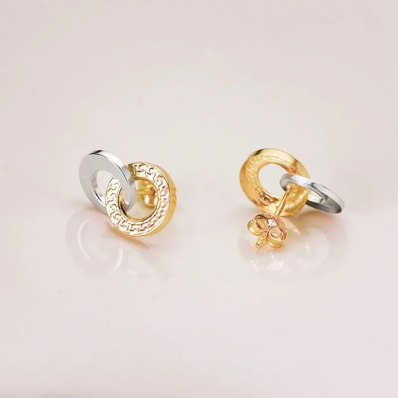 Pendientes en Oro Bicolor 18k con 13 mm. aros entrelazados liso detal