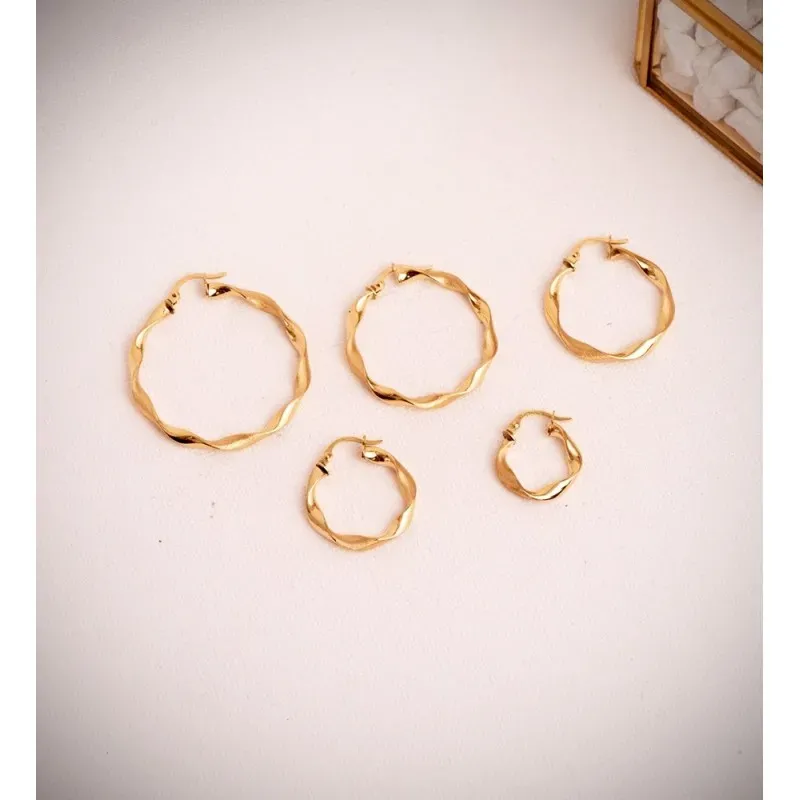 Aros Pendientes en Oro de 18k con 34 mm. huecos reliados combinados m