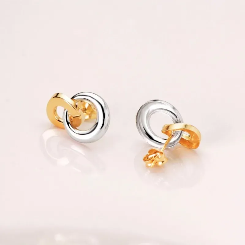 Pendientes en Oro Bicolor 18k con 13 mm. dos aros lisos entrelazados