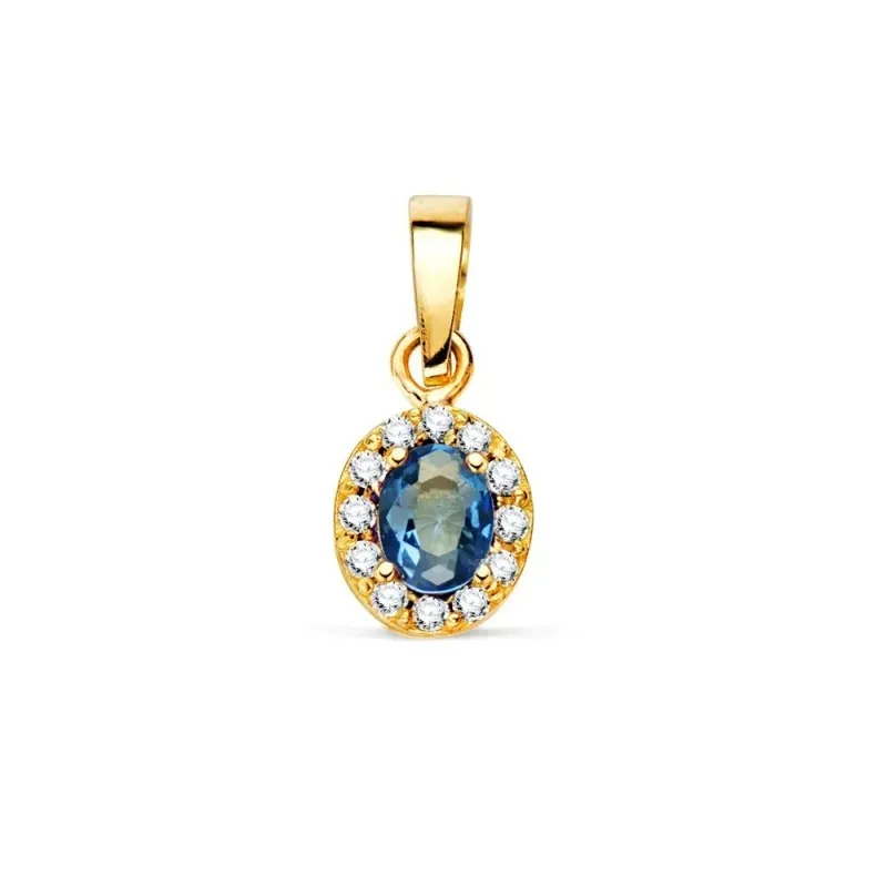 Colgante en Oro de 18k con 6.5 mm. ovalado piedra azul centro combina