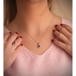 Colgante oro blanco 18k mujer 10 mm. zafiro combinado 14 diamantes 0.