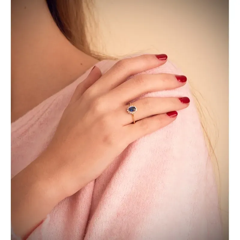 Sortija Oro 18k mujer zafiro centro 0.62ct. combinado 14 diamantes 0.