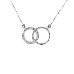Colgante con cadena Oro Blanco 18k modelo Circles (16 diamantes 1,00mm. 0,09 cts.) Colgante:12x8mm.