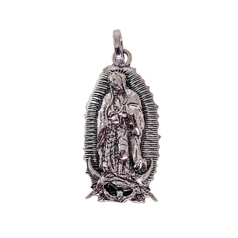 Virgen de Guadalupe Medalla en Plata Ley 925m de 24 mm. oxidada relie