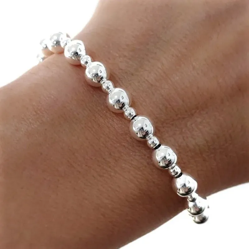 Pulsera plata Ley 925m combinada bolas 6mm. y 3mm. 19cm. [AB3550]