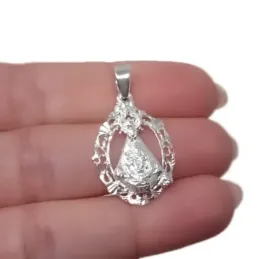 Virgen de Tíscar Silueta en Plata de Ley 925m con 25 mm. con cerco ca