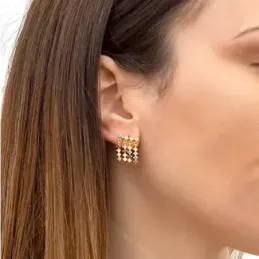 Pendientes en Plata de Ley 925m chapados en oro con 15 mm. circonitas