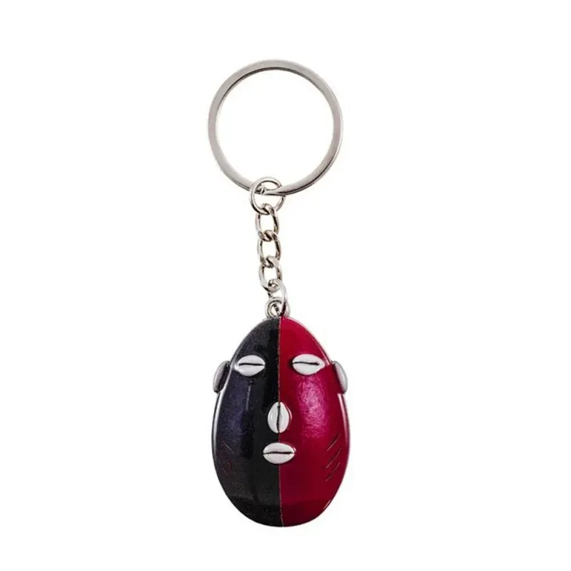 Cabeza de Elegua Llavero metálilco de 5 cm. y 3 cm. de ancho represen
