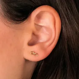 Pendientes oro 18k símbolo infinito 8mm. liso calado cierre tornillo