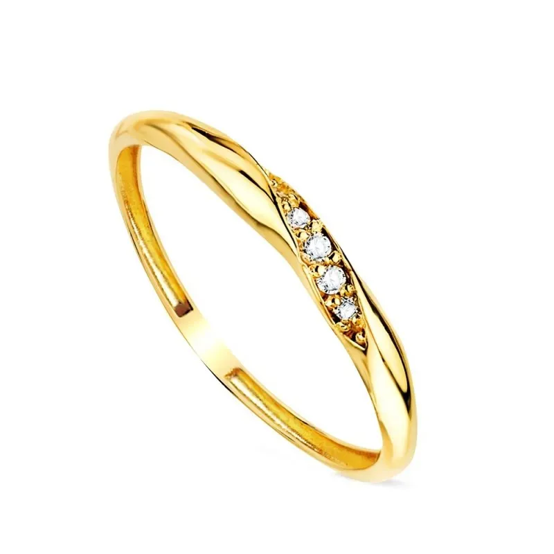 Sortija en Oro 18k reliada 4 diamantes 0.05ct. ancho máximo cuerpo 2.