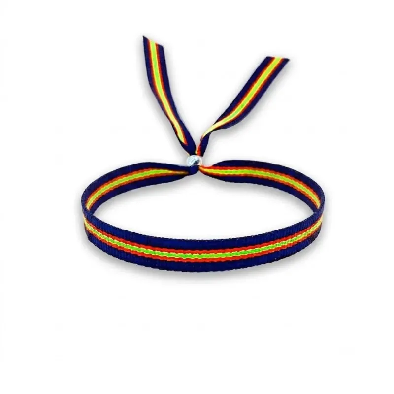 Pulsera bandera de España en tela azul con 22 cm. ancho de 10 mm. con