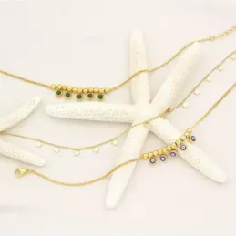 Ojo Turco Tobillera en Acero Inoxidable chapado en oro con 21 cm. bol