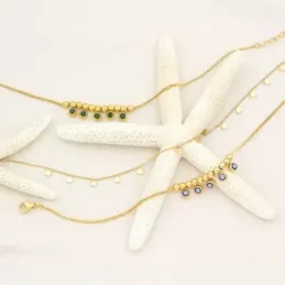 Tobillera en Acero Inoxidable chapado en oro con 21 cm. detalle bolas