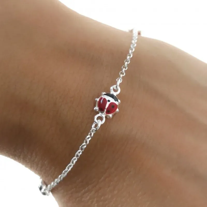 Pulsera Infantil en Plata de Ley 925m con 14 cm. con mariquitas esmal