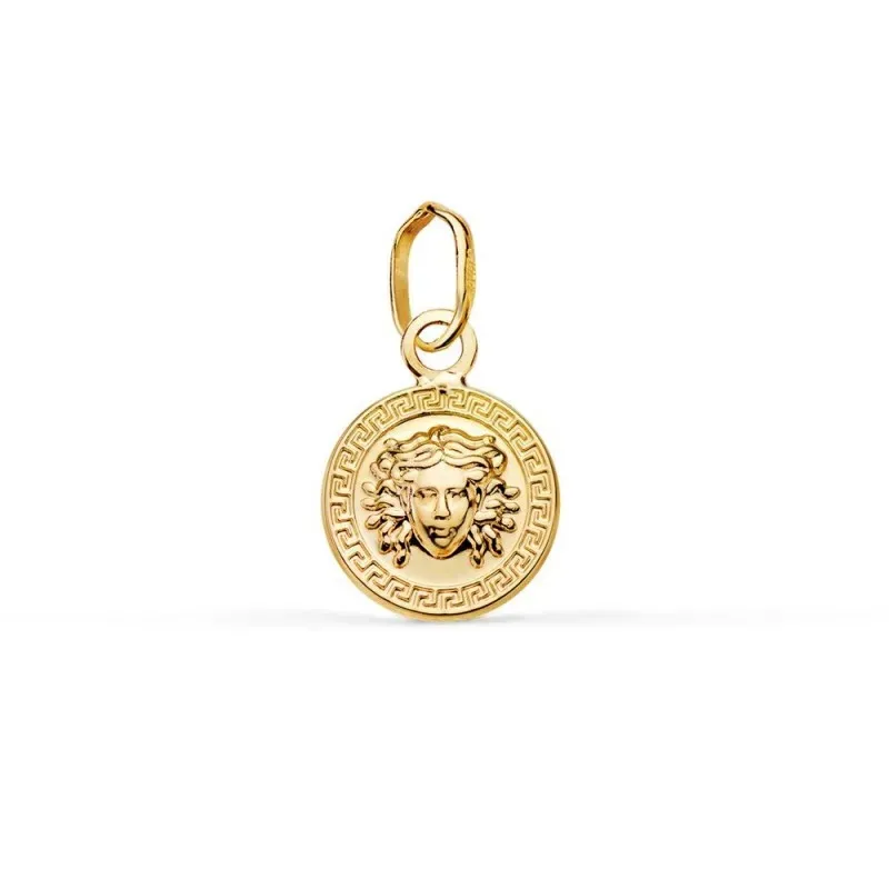Colgante en Oro de 18k con 10 mm. y medusa en el centro con un detall