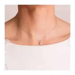 Colgante en Oro Blanco de 18k con 7 mm. y 7 diamantes de laboratorio