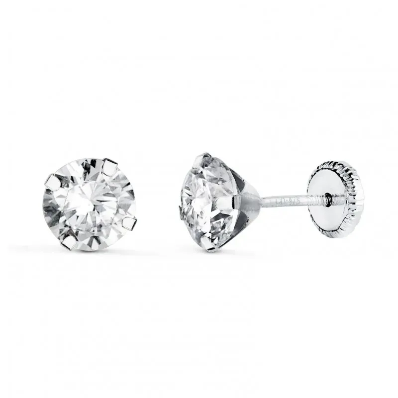 Pendientes en Oro Blanco de 18k con circonita de 6 mm. y cuatro garra