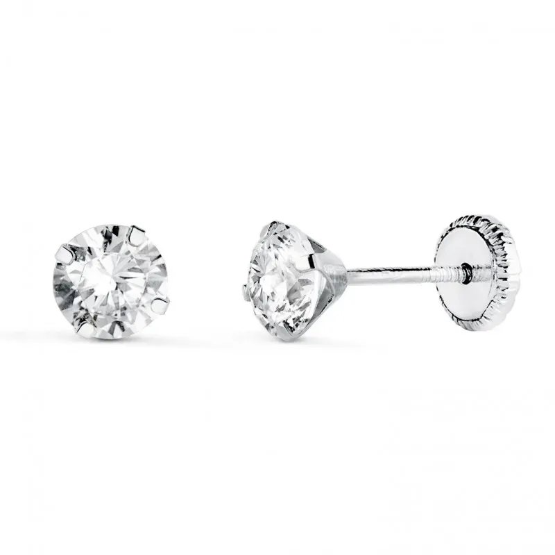 Pendientes en Oro Blanco de 18k con circonita de 5 mm. y cuatro garra