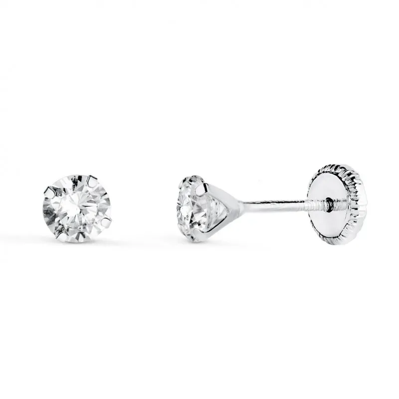 Pendientes en Oro Blanco de 18k con circonita de 4 mm. y cuatro garra