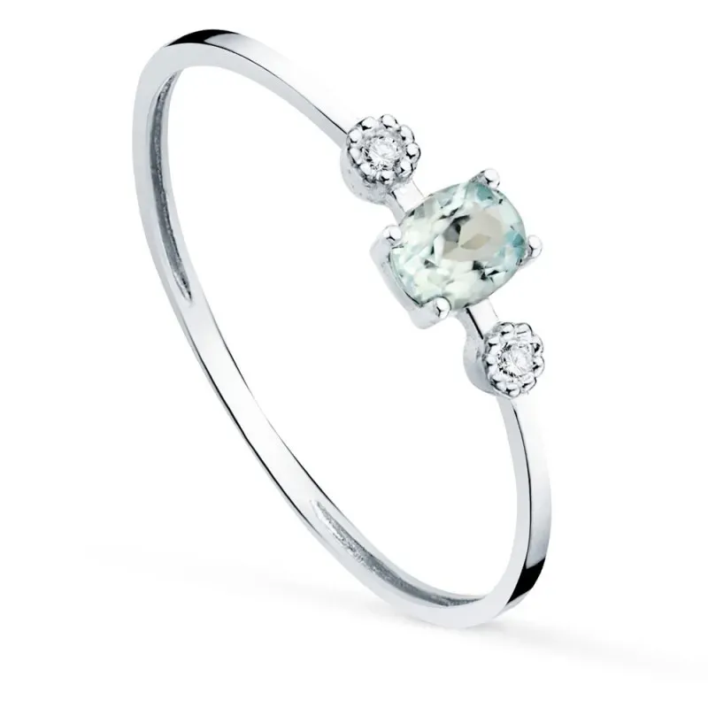 Sortija oro blanco 18k mujer aguamarina 4 mm. dos diamantes 0.016ct.