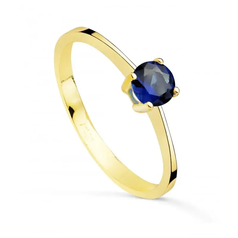 Solitario en Oro de 18k con circonita de color azul con 5 mm. garras