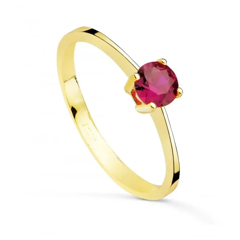 Solitario en Oro de 18k con circonita de color rosa con 5 mm. garras