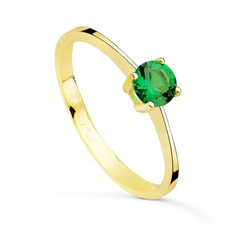 Solitario en Oro de 18k con circonita de color verde con 5 mm. garras