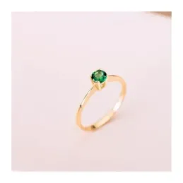 Solitario en Oro de 18k con circonita de color verde con 5 mm. garras