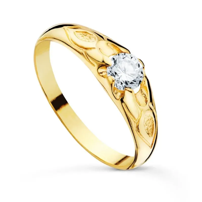 Solitrario oro 18k niño circonita centro 4,2 mm. detalles tallados