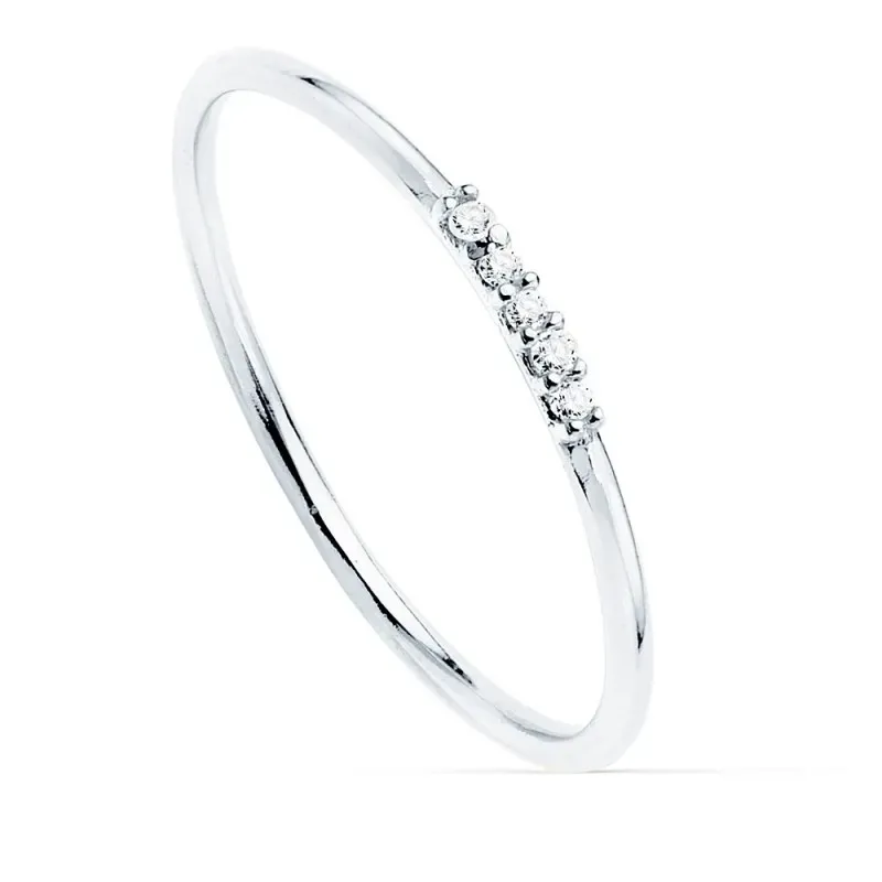 Sortija oro blanco 18k recta diamantes brillantes 0.025ct. cuerpo redondo 1mm. mujer