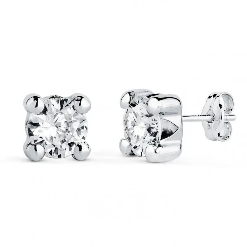 Pendientes en Oro Blanco de 18k con circonita redonda de 6 mm. y cuat