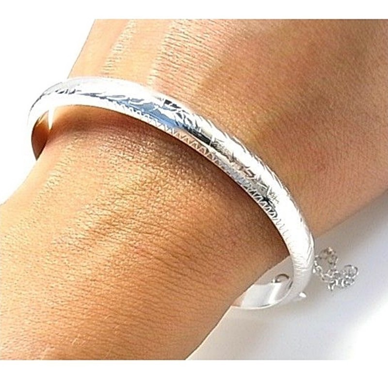 Pulsera media caña plata Ley 925m tallada diámetro 60mm. cadenita de seguridad