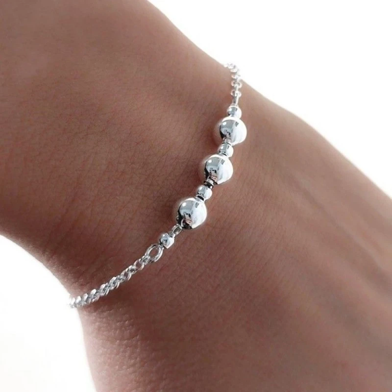 Pulsera Plata Ley 925m mujer 16.5 cm. cadena rolo detalle bolas lisas