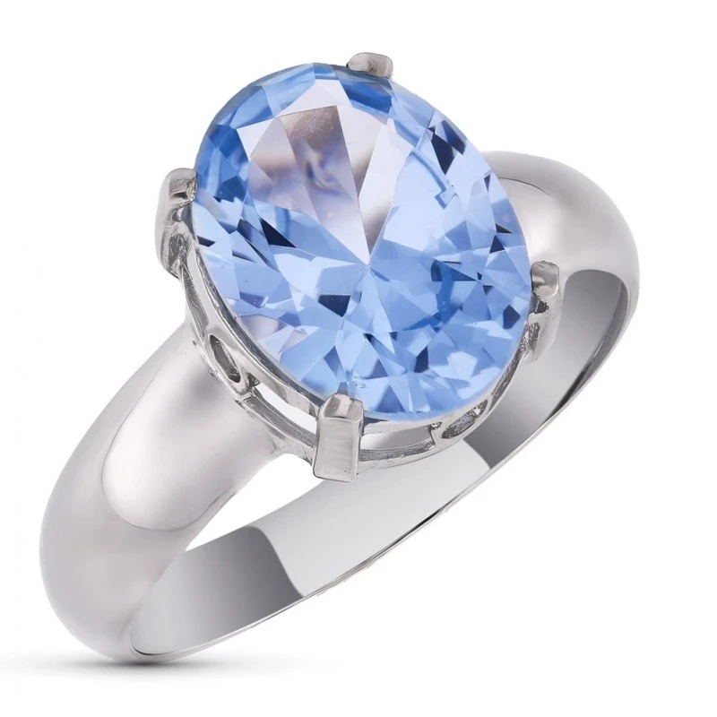 Sortija Oro Blanco 18k mujer piedra color azul centro cabeza ovalada